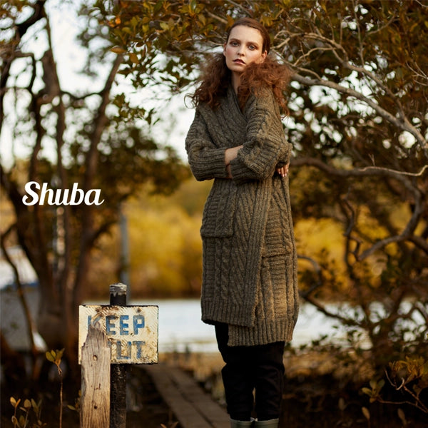 Editorial feature in Shuba Magazine with hair styled by Jill Turnbull using her botanical haircare professional, ocean-safe formulas rooted in decades of experience.